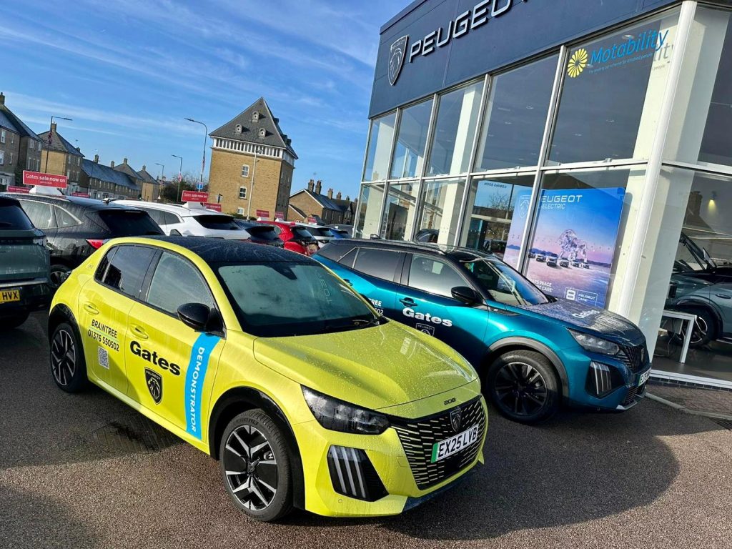 Peugeot car with Gates Automotive Dealership Branding on